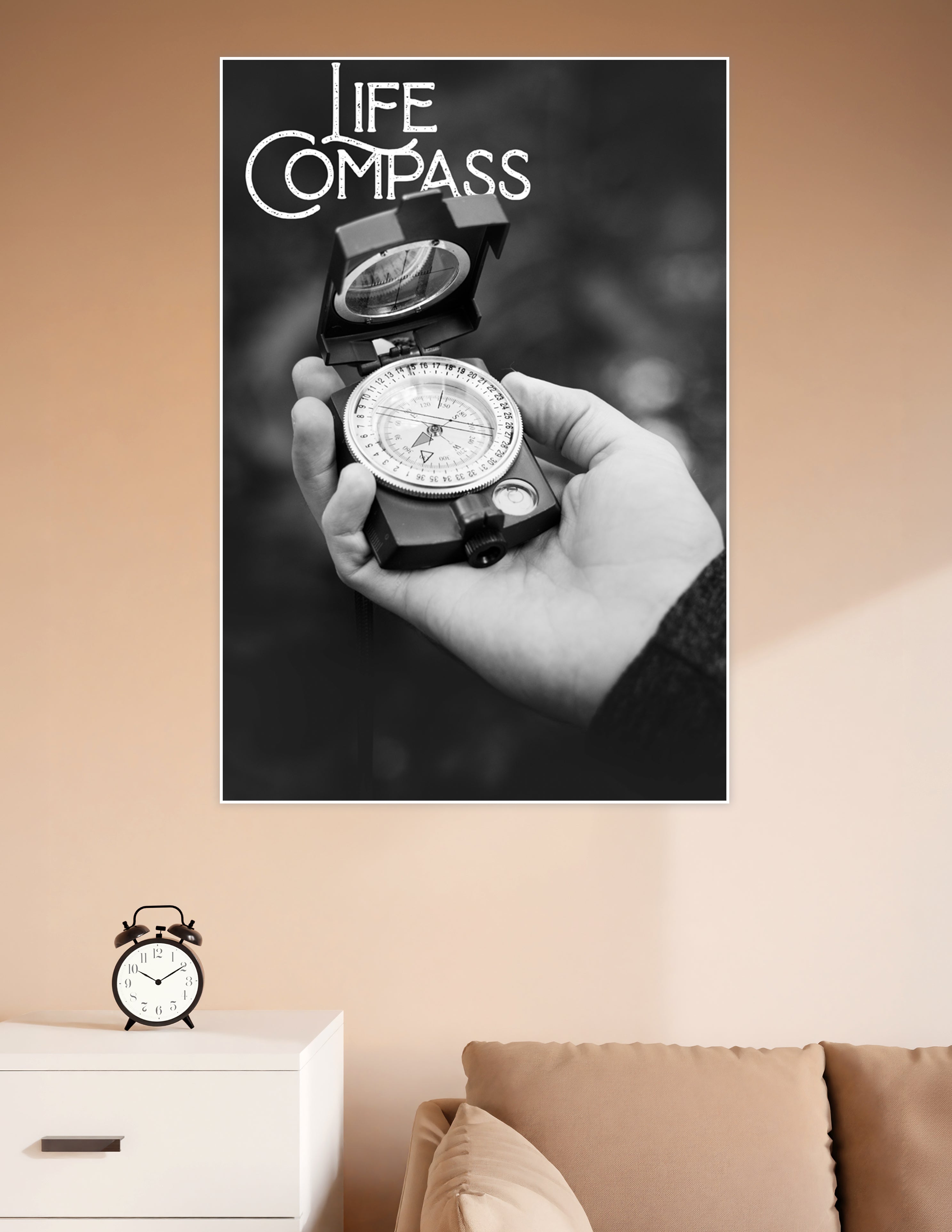 Black and white poster showing a hand holding a military compass with bold Life Compass typography overlay