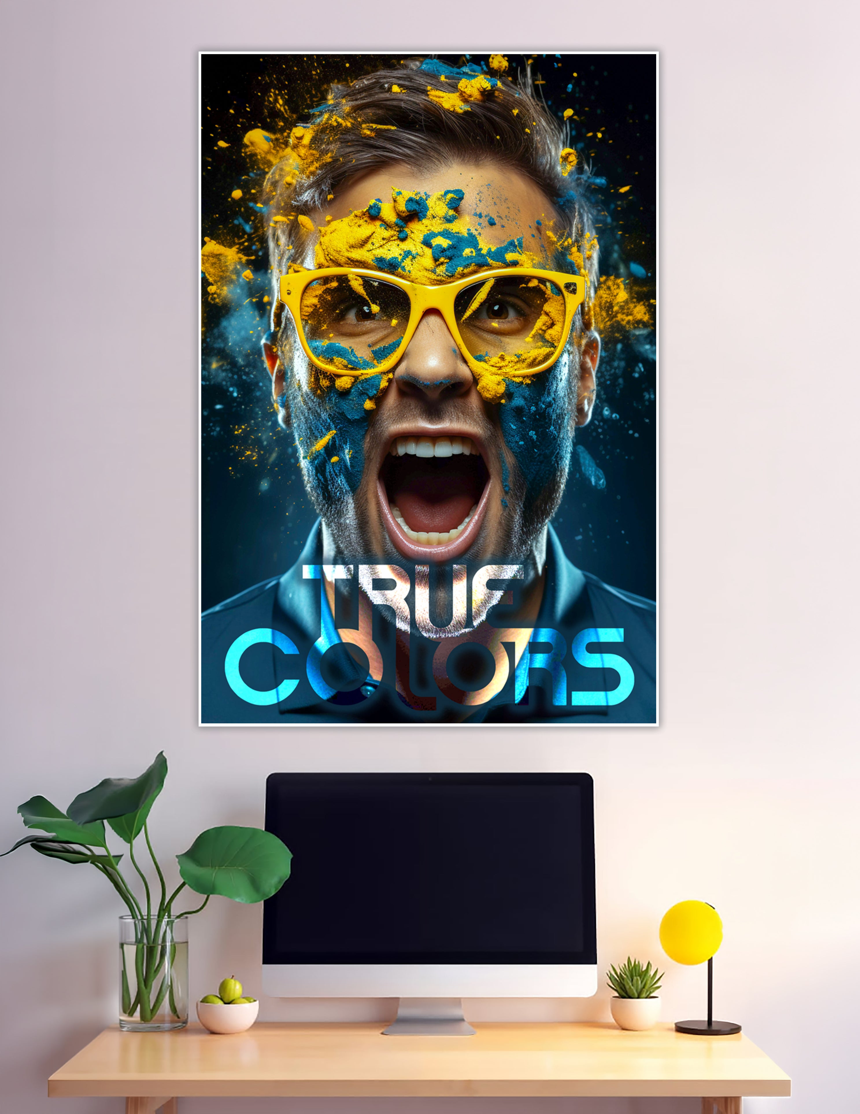 Man with yellow glasses covered in exploding yellow and teal powder with bold True Colors typography on dark background