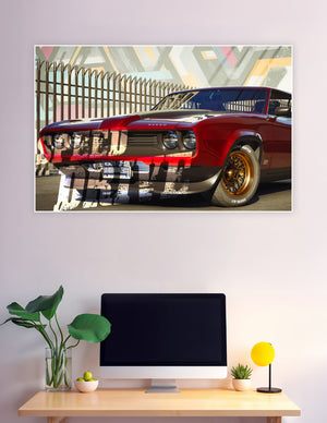 Red classic muscle car with gold rims against graffiti mural