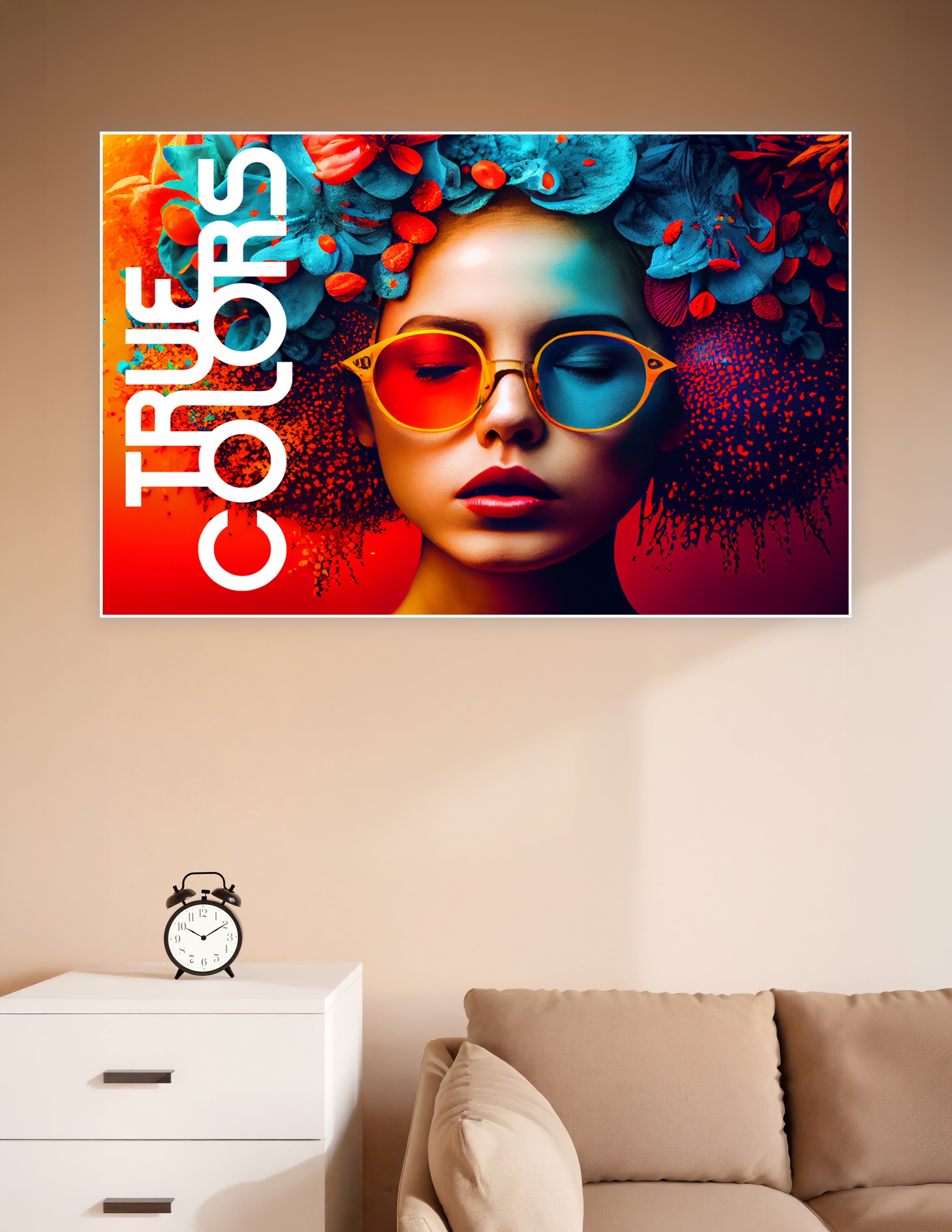 Surreal fashion art poster of a woman with vibrant blue floral headwear and split red-blue sunglasses against a bold red and teal background, titled True Colors