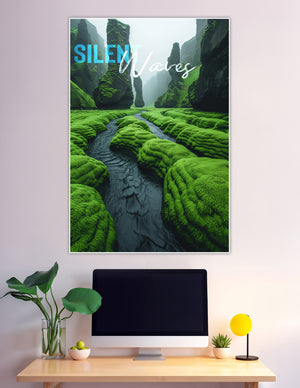 Mossy canyon river winding through misty green rocks