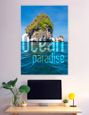 Tropical limestone island rising from vivid blue ocean waters