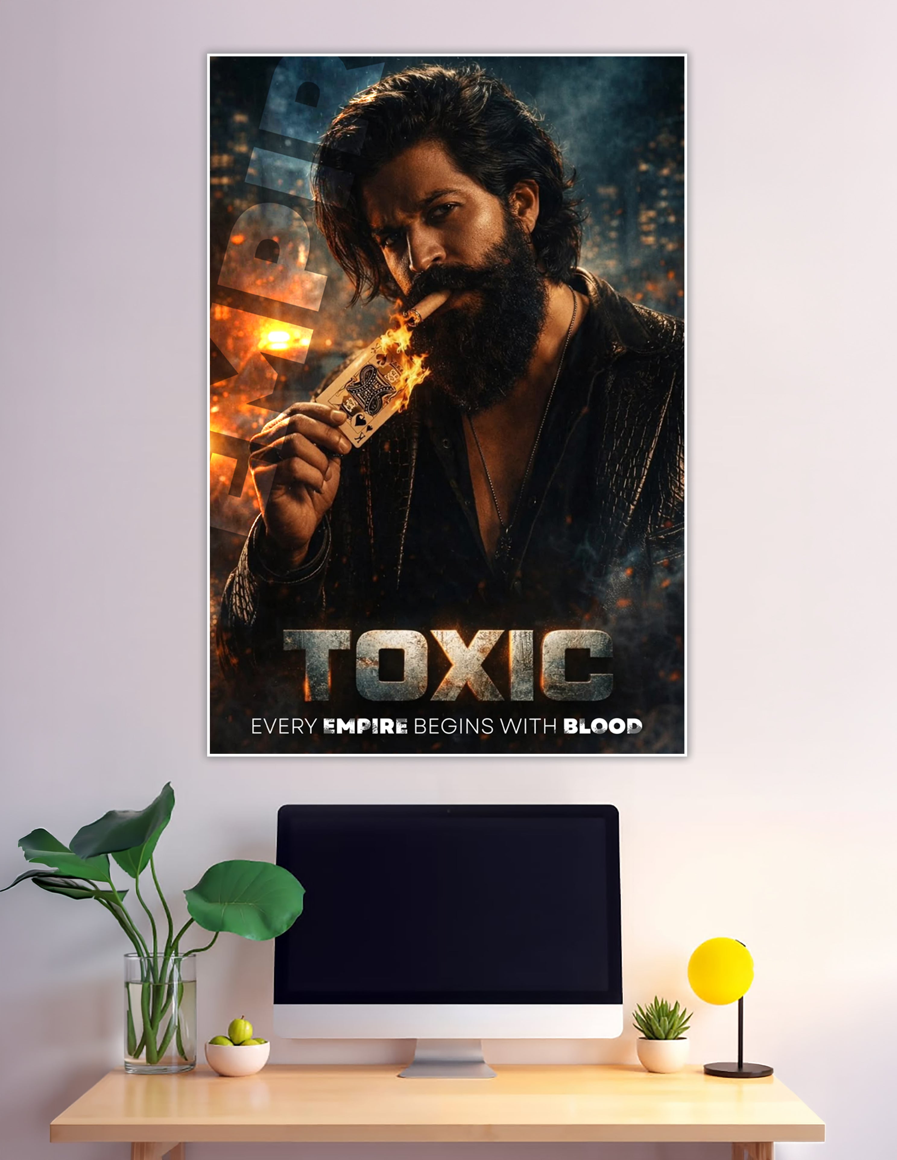 Toxic movie poster featuring a bearded man lighting a playing card on fire with the tagline Every Empire Begins With Blood