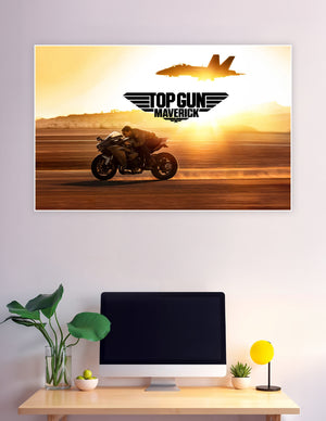 Top Gun Maverick movie poster showing a rider on a sport motorcycle racing at golden sunset with an F/A-18 fighter jet silhouette in the sky