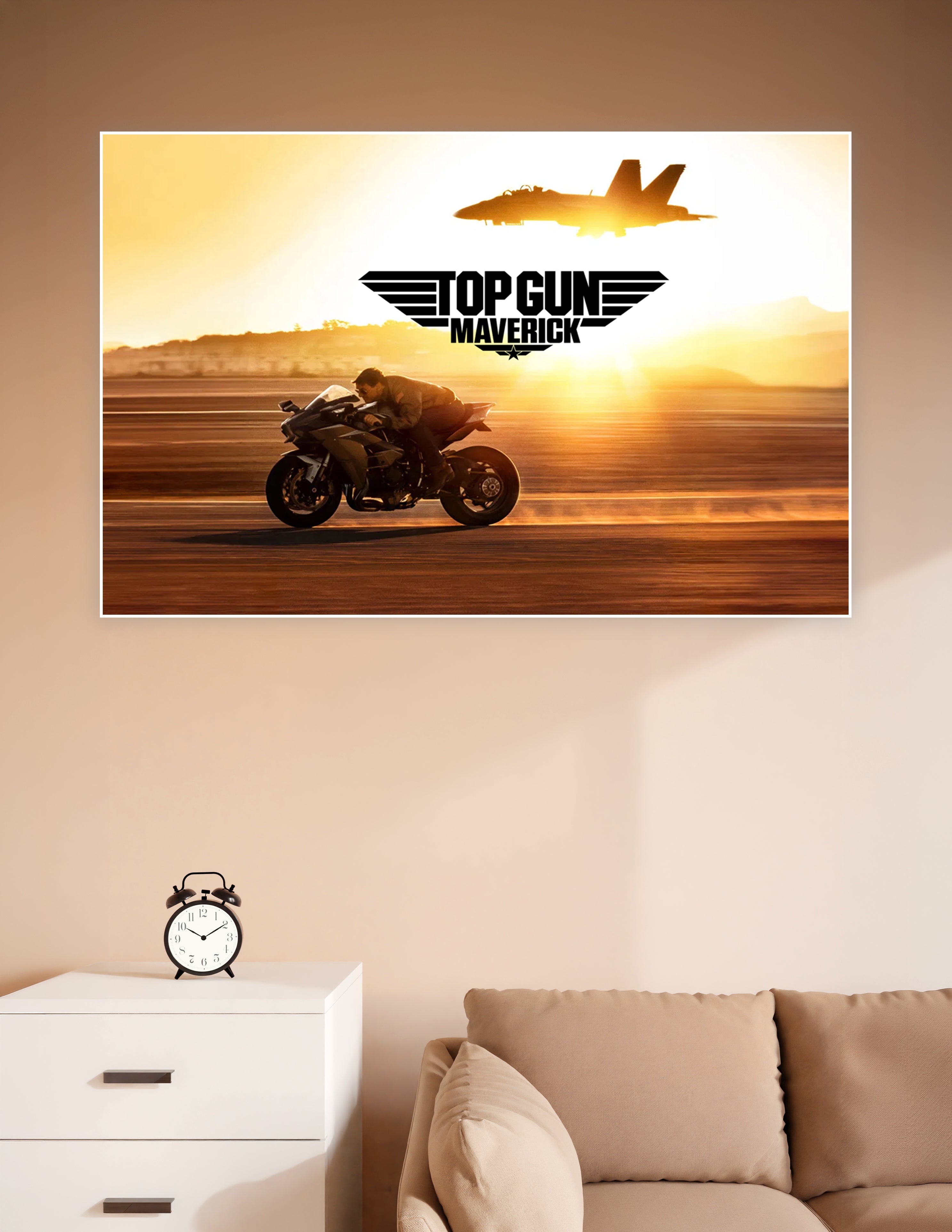 Top Gun Maverick movie poster showing a rider on a sport motorcycle racing at golden sunset with an F/A-18 fighter jet silhouette in the sky