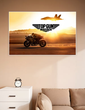 Top Gun Maverick movie poster showing a rider on a sport motorcycle racing at golden sunset with an F/A-18 fighter jet silhouette in the sky