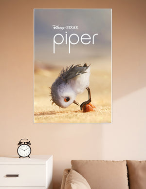 Disney Pixar Piper animated short film poster showing a fluffy baby sandpiper chick bending down on a golden sandy beach