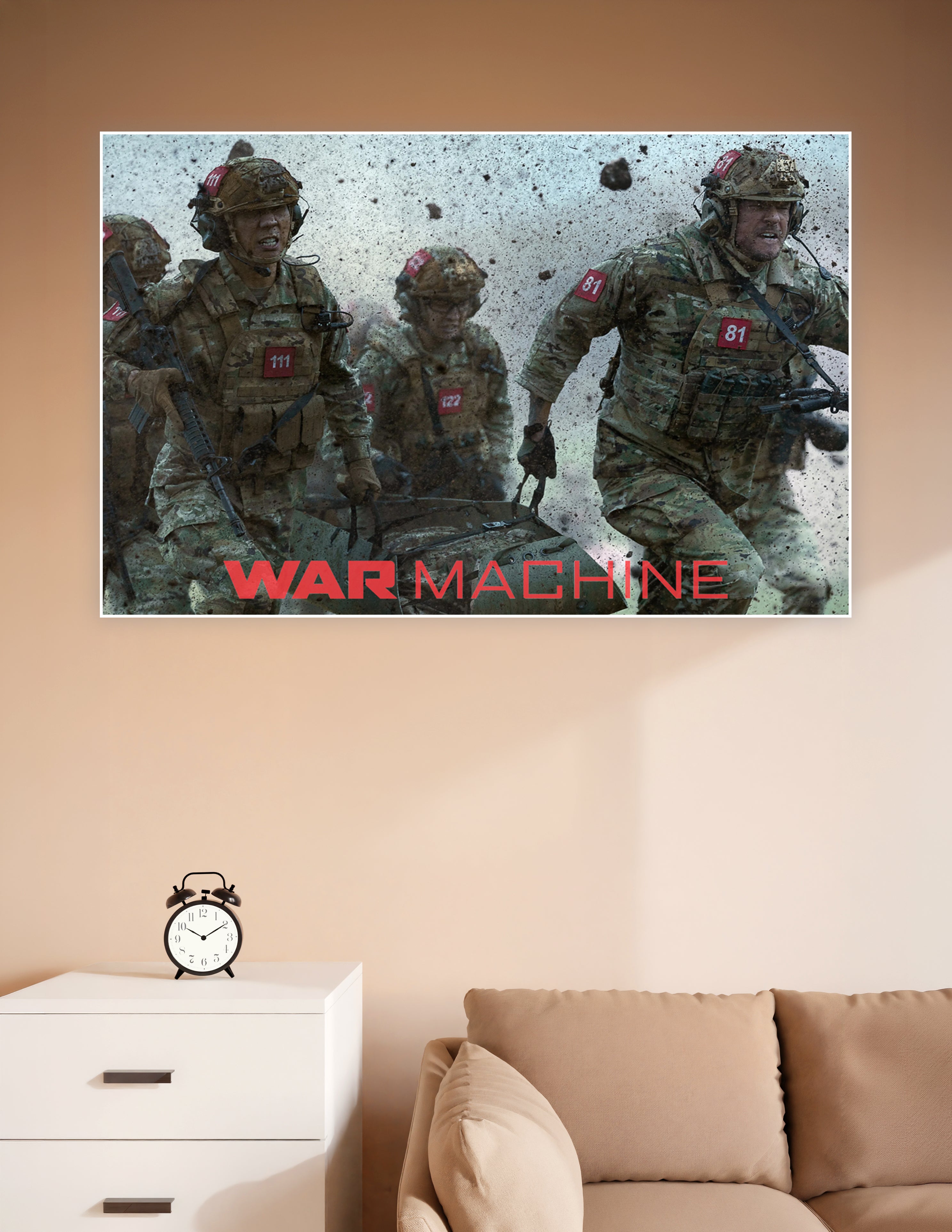 War Machine movie poster showing soldiers in camouflage gear with numbered red badges charging through an explosive battlefield with debris flying
