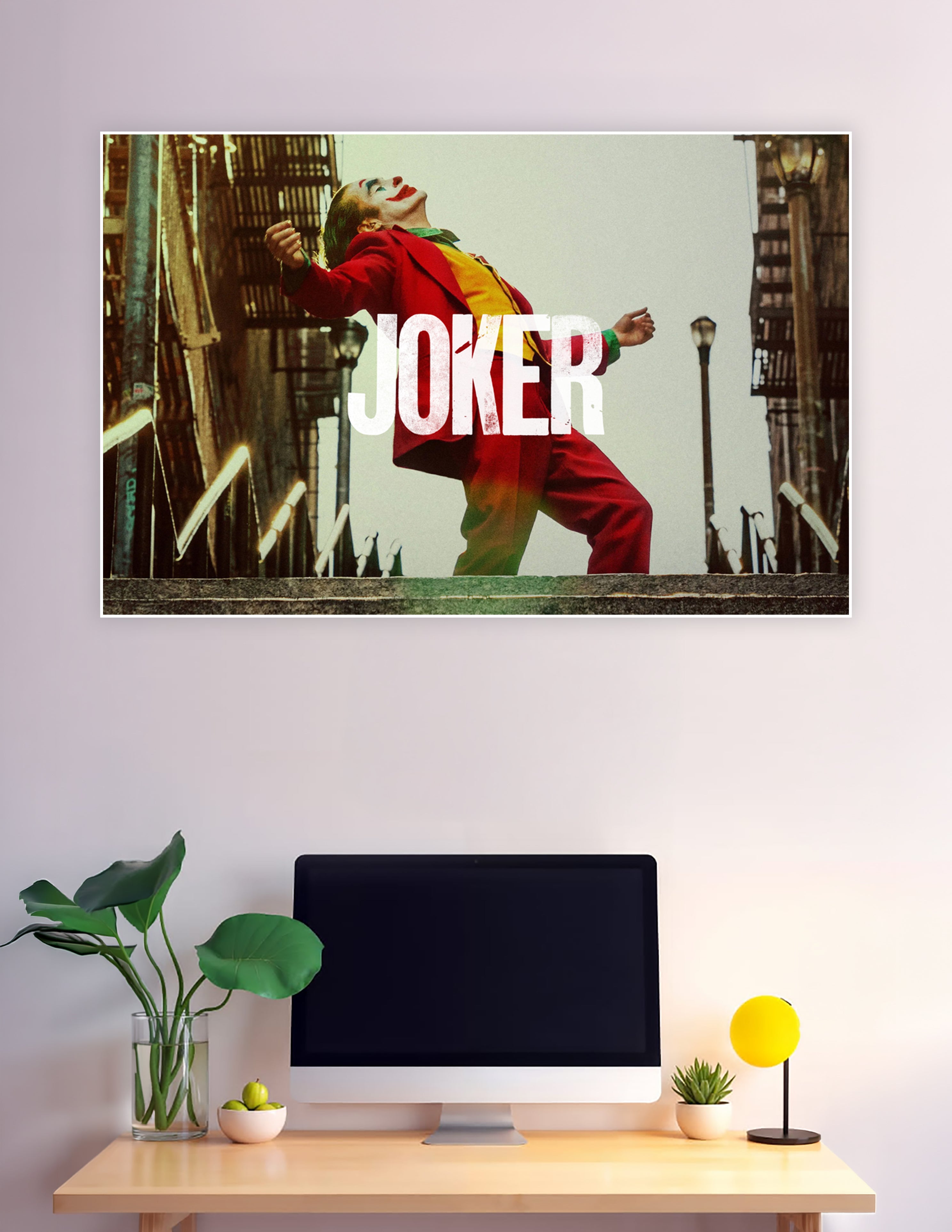 Joker dancing on Gotham stairs in red suit poster