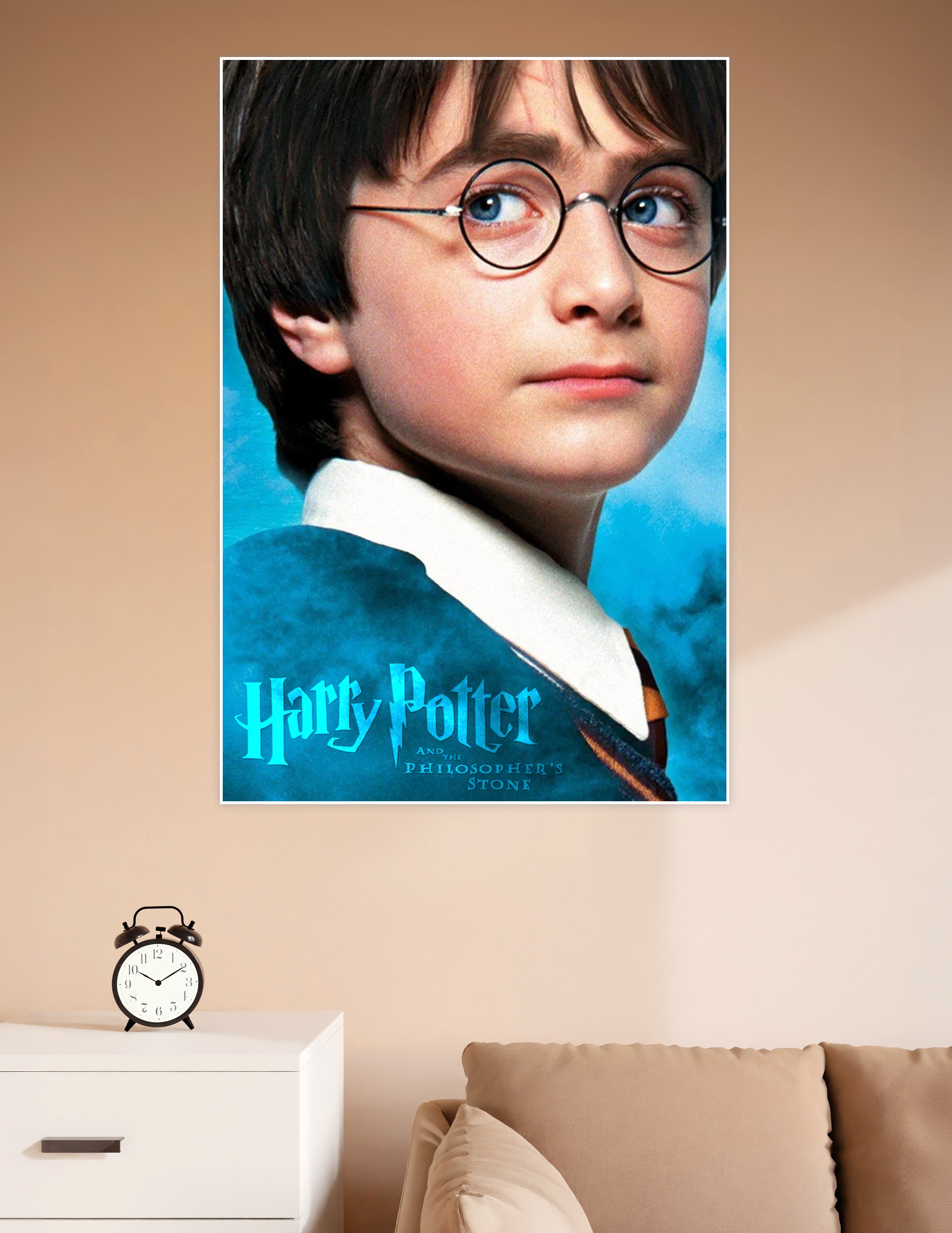 Harry Potter and the Philosopher's Stone movie poster featuring a close-up of young Harry Potter wearing round glasses and Hogwarts robes against a teal blue background