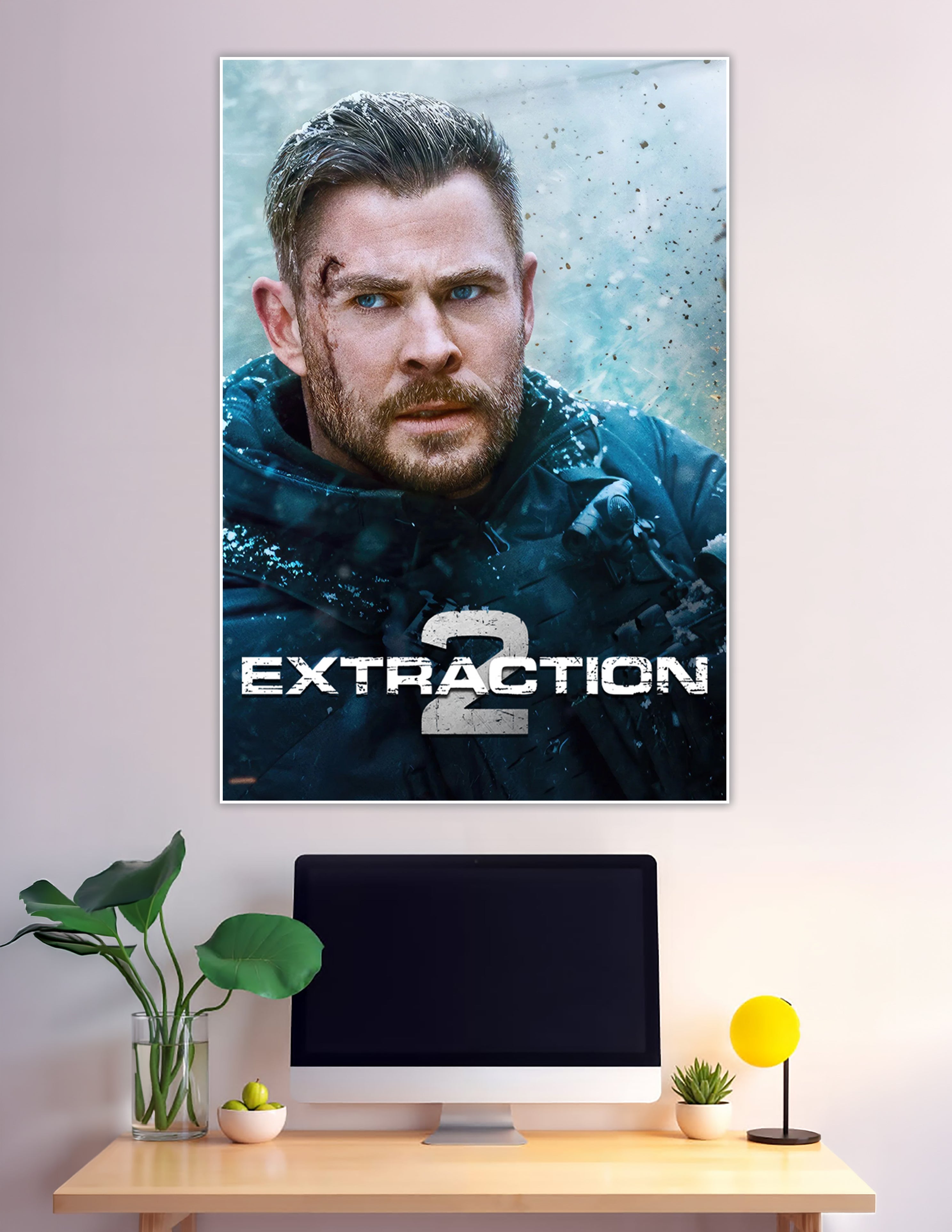 Extraction 2 movie poster featuring a close-up of Tyler Rake with blue eyes, battle scars, and snow-dusted tactical gear against an icy explosive background