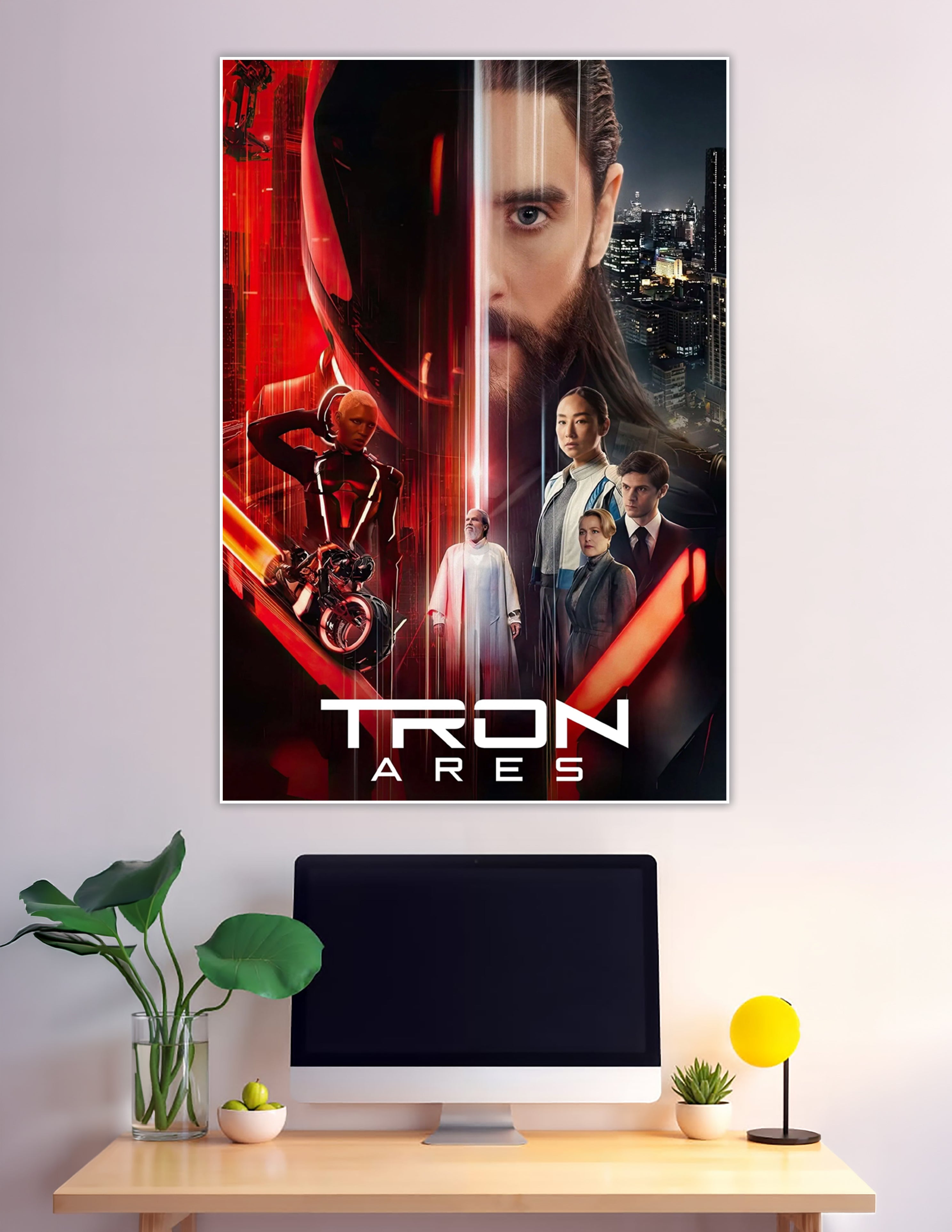 TRON Ares official movie poster featuring a bearded male lead, neon red Grid characters, light cycle, and futuristic cityscape on a dark dramatic background