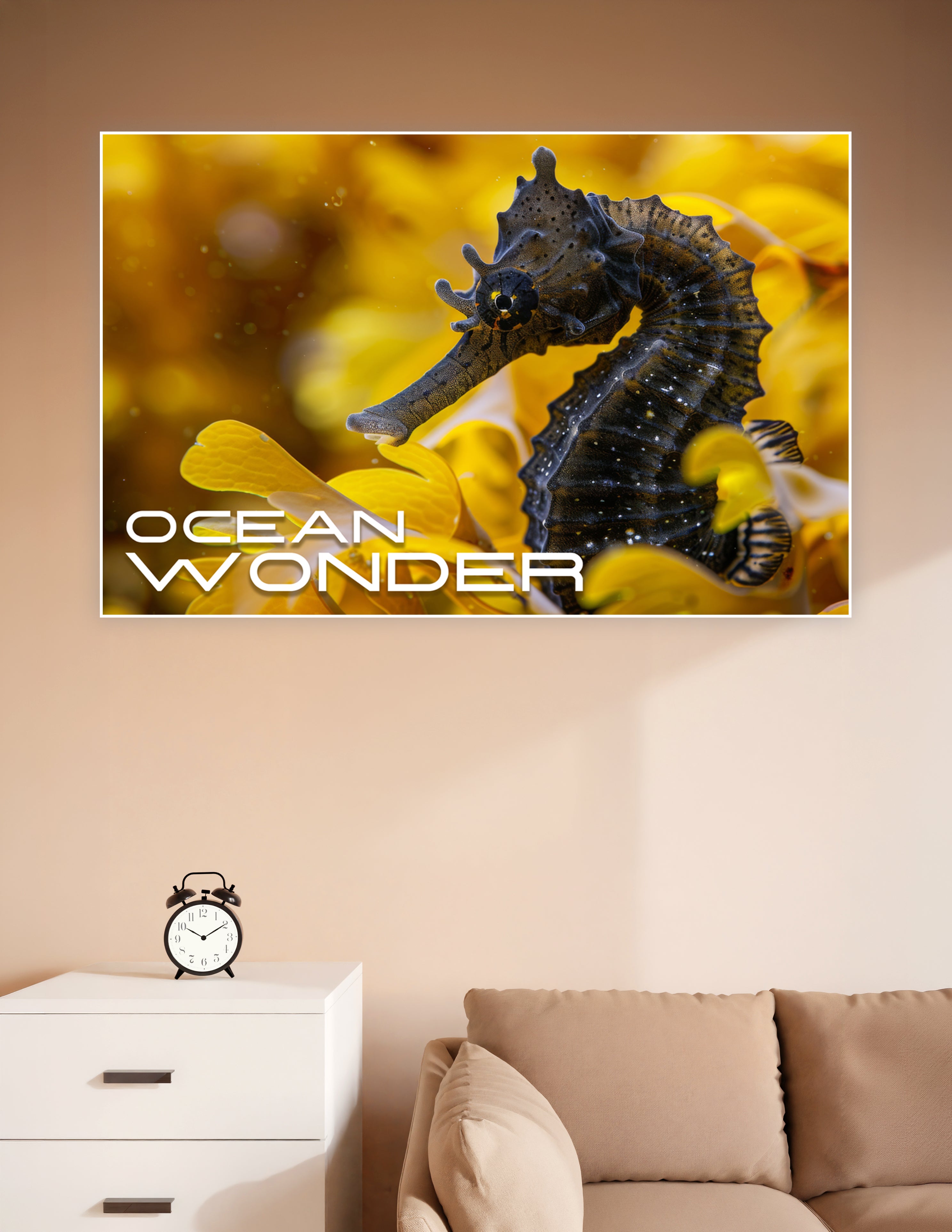 Close-up macro photograph of a dark seahorse clinging to golden yellow seaweed underwater, with 'Ocean Wonder' text overlay