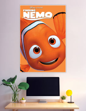 Disney Pixar Finding Nemo official movie poster featuring a close-up of Nemo the clownfish smiling on a bright orange background