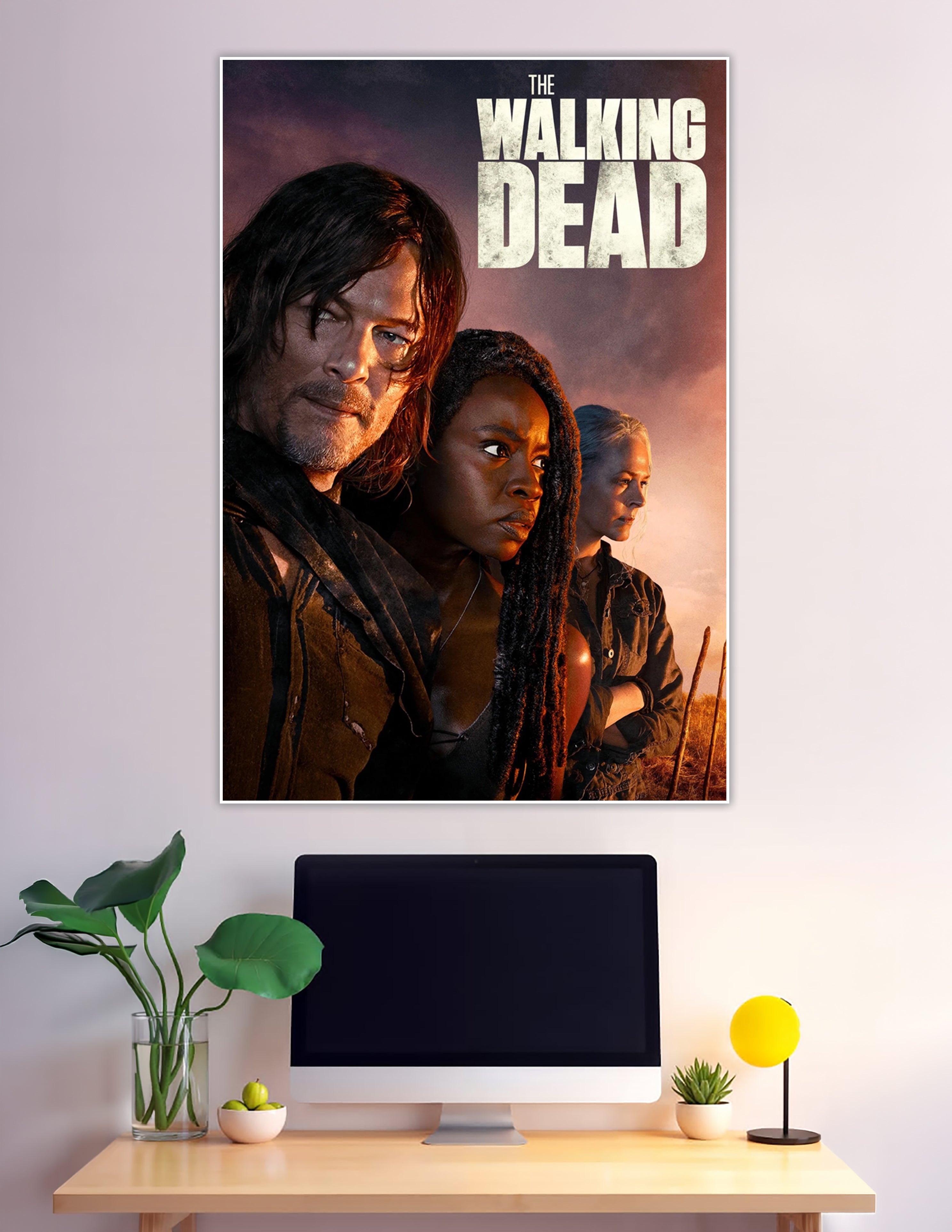 The Walking Dead official poster featuring Daryl Dixon, Michonne, and Carol against a dramatic fiery apocalyptic sky background