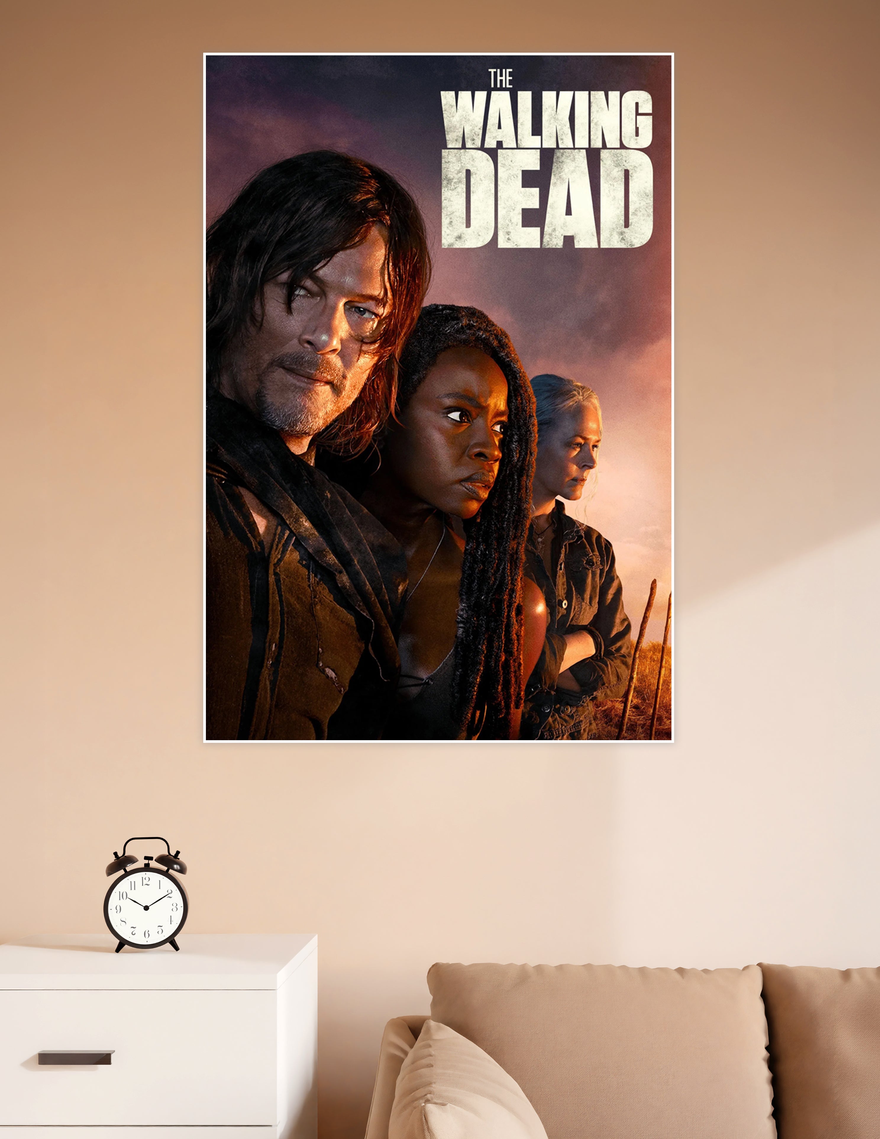 The Walking Dead official poster featuring Daryl Dixon, Michonne, and Carol against a dramatic fiery apocalyptic sky background