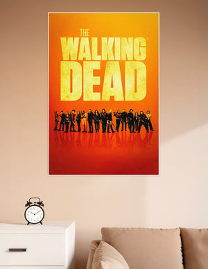 The Walking Dead official cast poster with ensemble lineup silhouetted against a fiery orange gradient background and bold yellow title typography