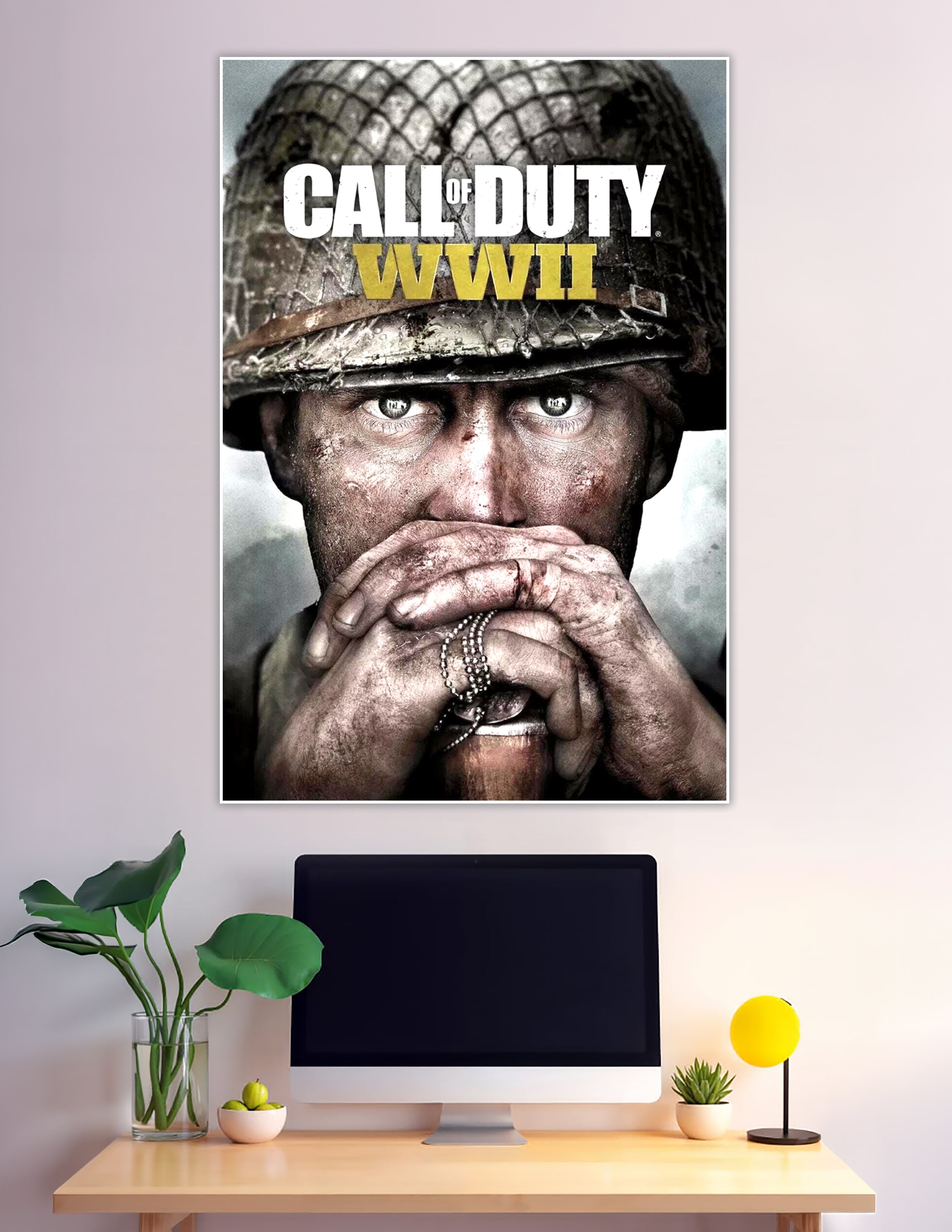 Call of Duty WWII official game cover poster featuring a battle-worn soldier clutching dog tags with intense eyes under a military helmet