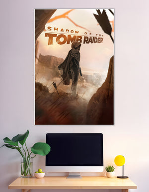 Shadow of the Tomb Raider poster showing hooded Lara Croft standing before misty ancient ruins in warm amber tones