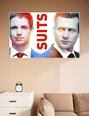 Suits TV show promotional poster featuring two main characters in dramatic red and amber color grading with bold SUITS title typography