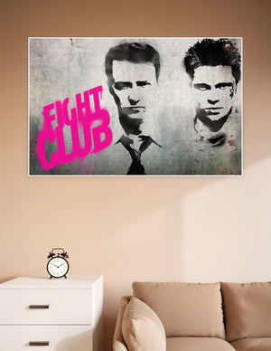 Fight Club movie poster with black stencil portraits of two men and bold neon-pink graffiti text on a gritty concrete wall background