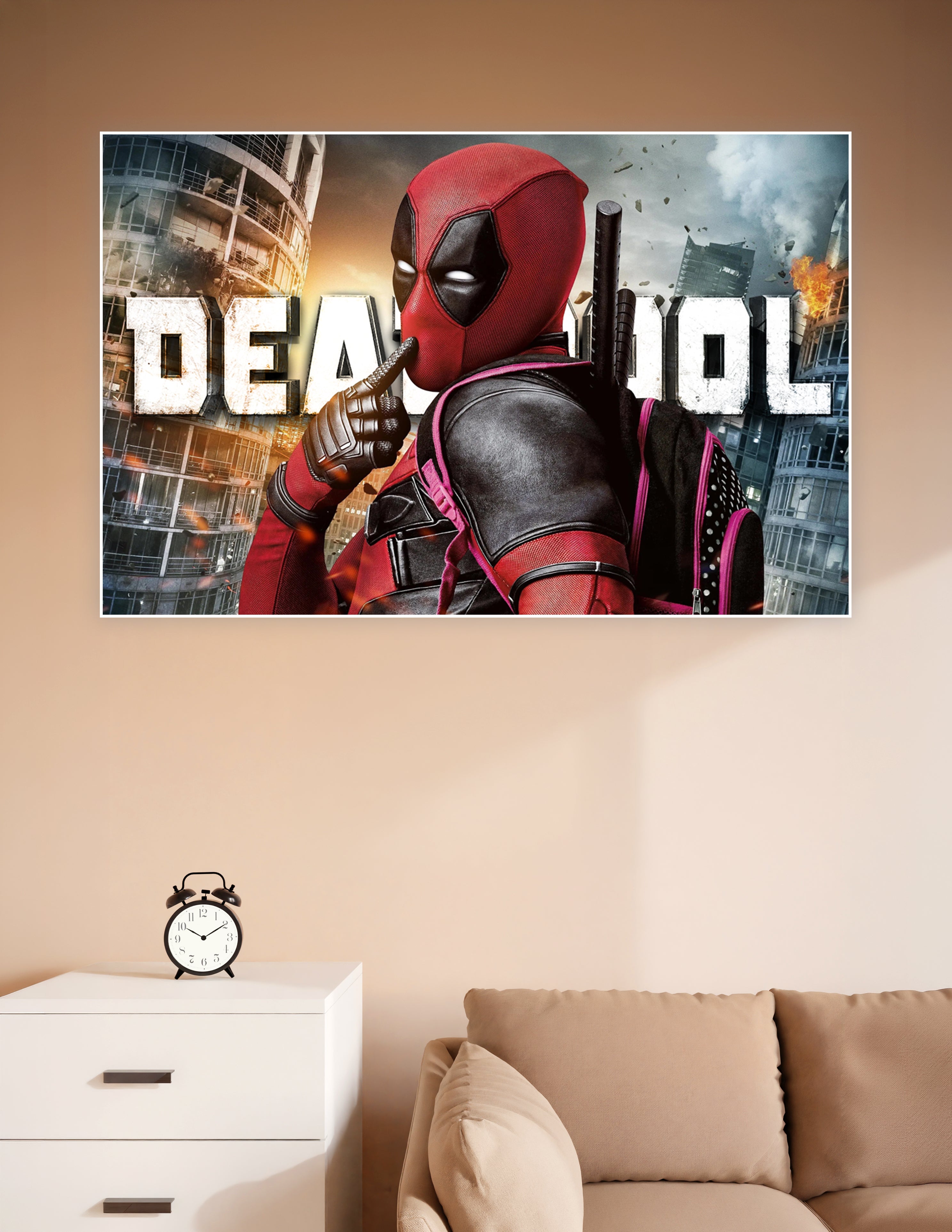 Deadpool in red and black suit posing confidently against an explosive cityscape with the Deadpool movie title logo in the background