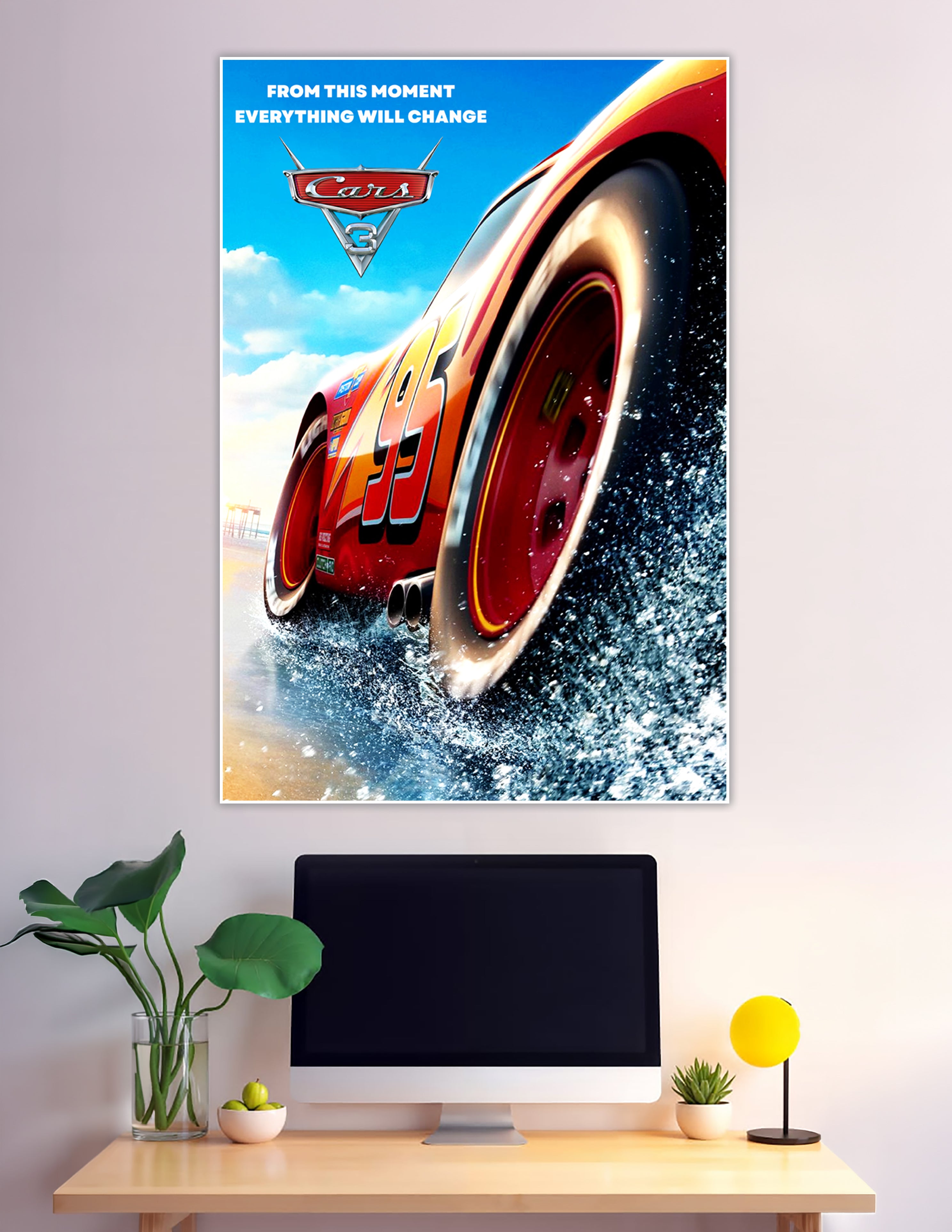 Cars 3 movie poster featuring Lightning McQueen number 95 racing through water with bold red and orange colors and the tagline From This Moment Everything Will Change