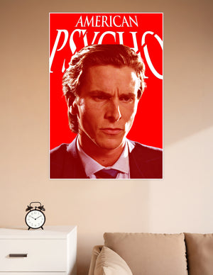 American Psycho movie poster featuring a brooding male portrait against a vivid red background with bold white title text