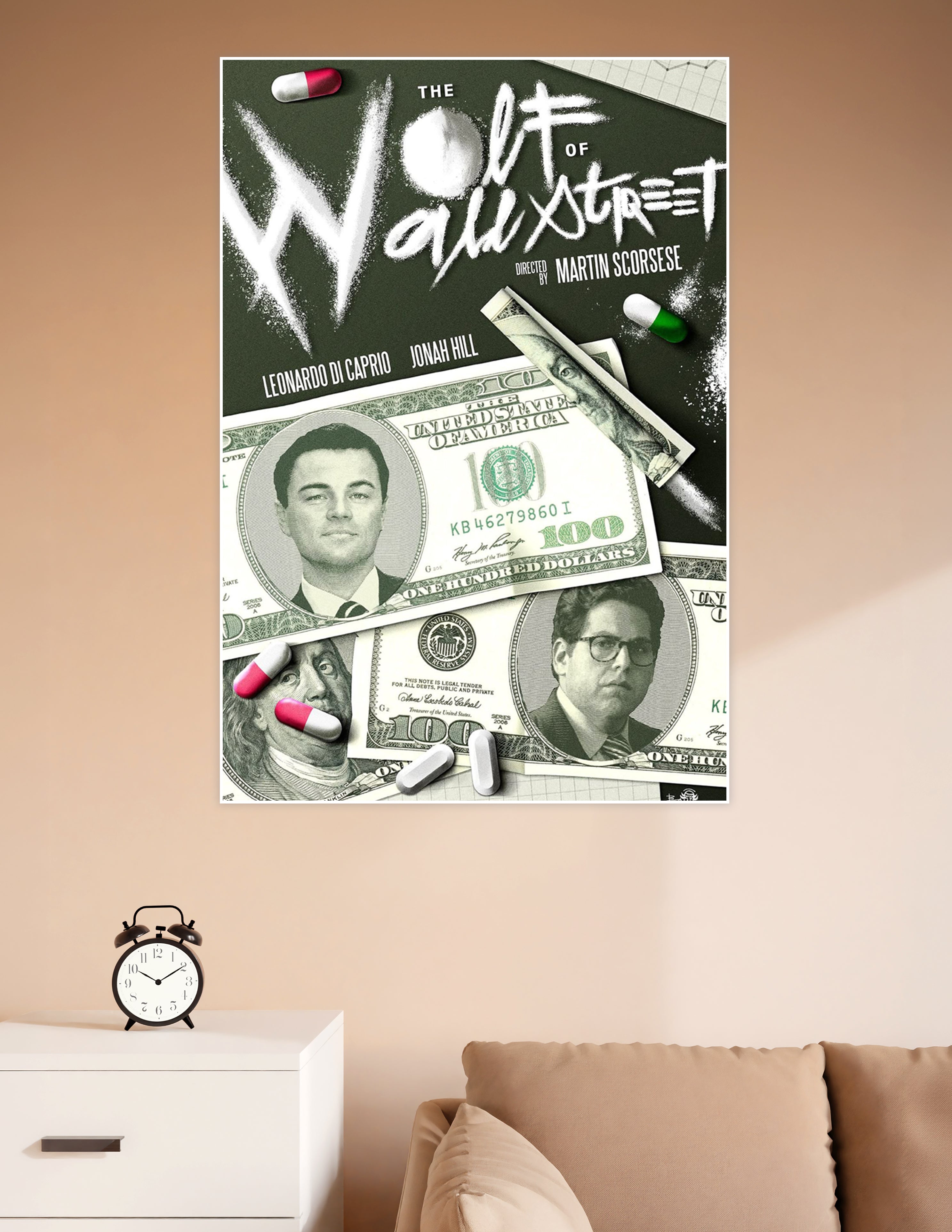 The Wolf of Wall Street movie poster directed by Martin Scorsese featuring Leonardo DiCaprio and Jonah Hill on hundred-dollar bills with white powder title typography on dark green background