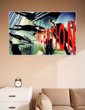 Inception movie poster featuring the cast in gravity-defying poses against a surreal folding cityscape with bold red INCEPTION title text