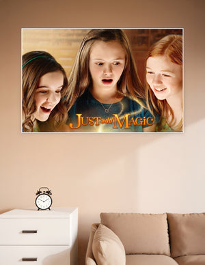 Just Add Magic Amazon Original series poster featuring three girls looking at a glowing magical cookbook with golden sparkles