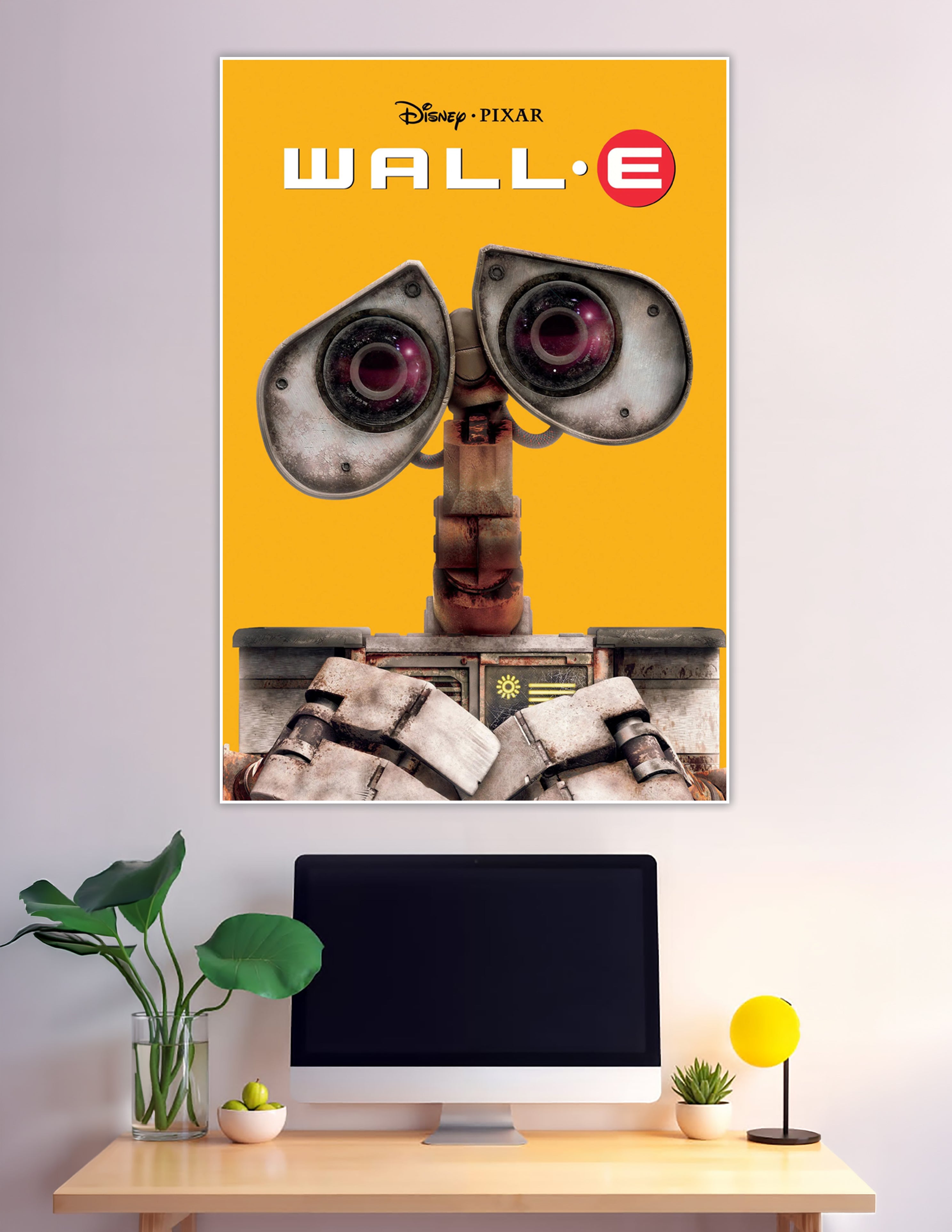 Disney Pixar WALL-E robot close-up on yellow background