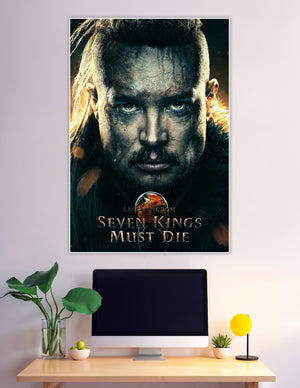 The Last Kingdom Seven Kings Must Die movie poster featuring a battle-worn Uhtred of Bebbanburg with a fierce gaze, dark war paint, and fiery background