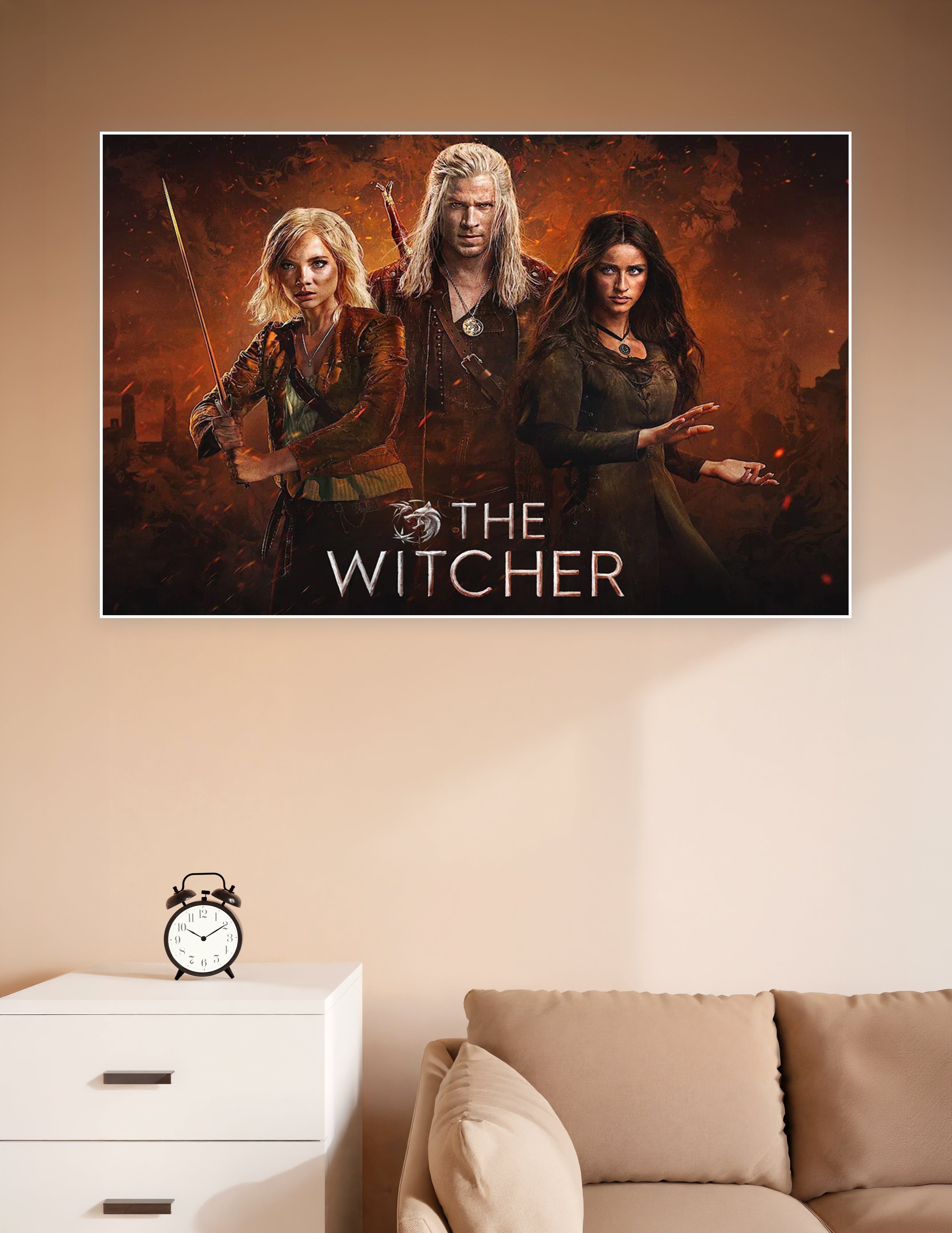 The Witcher Netflix series poster featuring Geralt, Ciri, and Yennefer against a fiery orange background with the show's logo