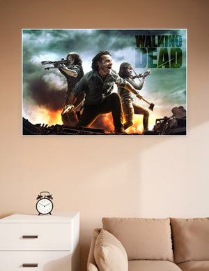 The Walking Dead promotional poster showing Rick Grimes, Daryl Dixon with crossbow, and Michonne with katana in front of fire and smoke with bold series title text