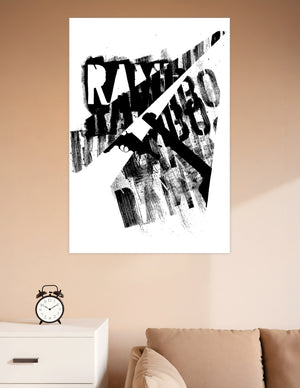 Black and white grunge art poster with Rambo stencil lettering, aggressive brushstroke textures, and a silhouetted figure holding a weapon