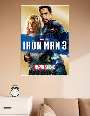 Iron Man 3 Marvel Studios official movie poster featuring Tony Stark in battle-damaged armor with a gold and blue cinematic background