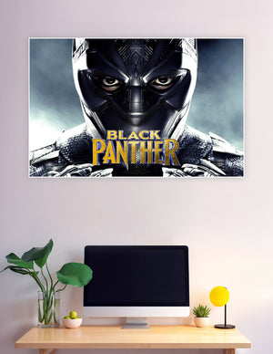 Black Panther in vibranium suit close-up movie poster with gold title text on dark stormy background