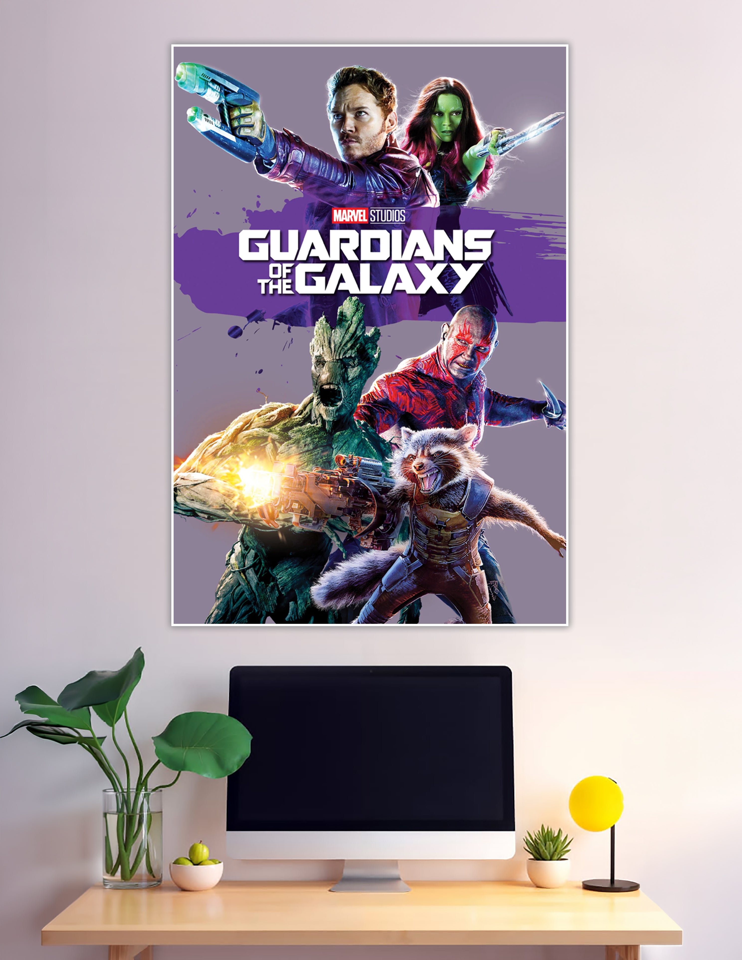 Guardians of the Galaxy Marvel Studios movie poster featuring Star-Lord, Gamora, Groot, Rocket Raccoon, and Drax on a purple background