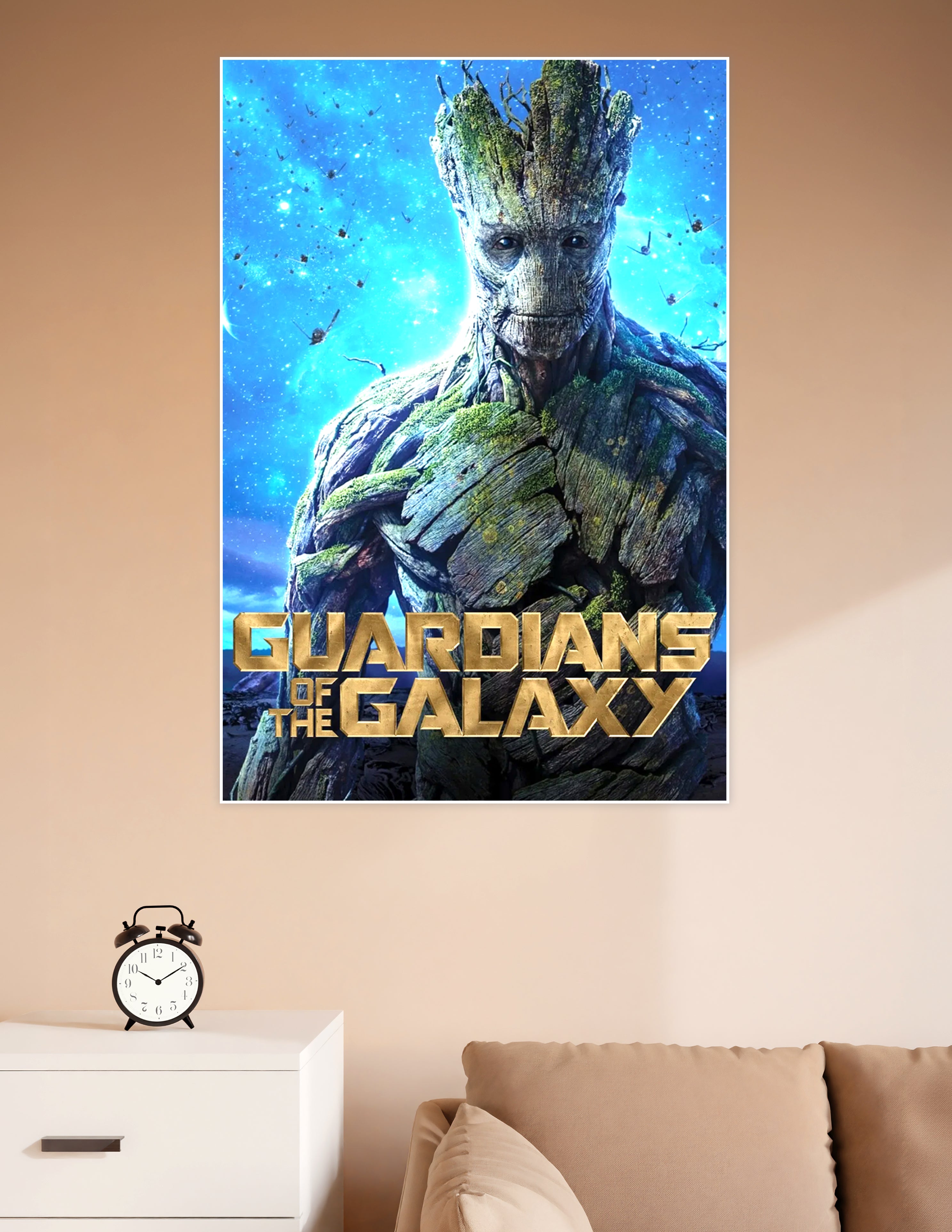 Groot from Guardians of the Galaxy standing against a glowing blue cosmic starfield with spacecraft in the background, movie title text in gold at the bottom