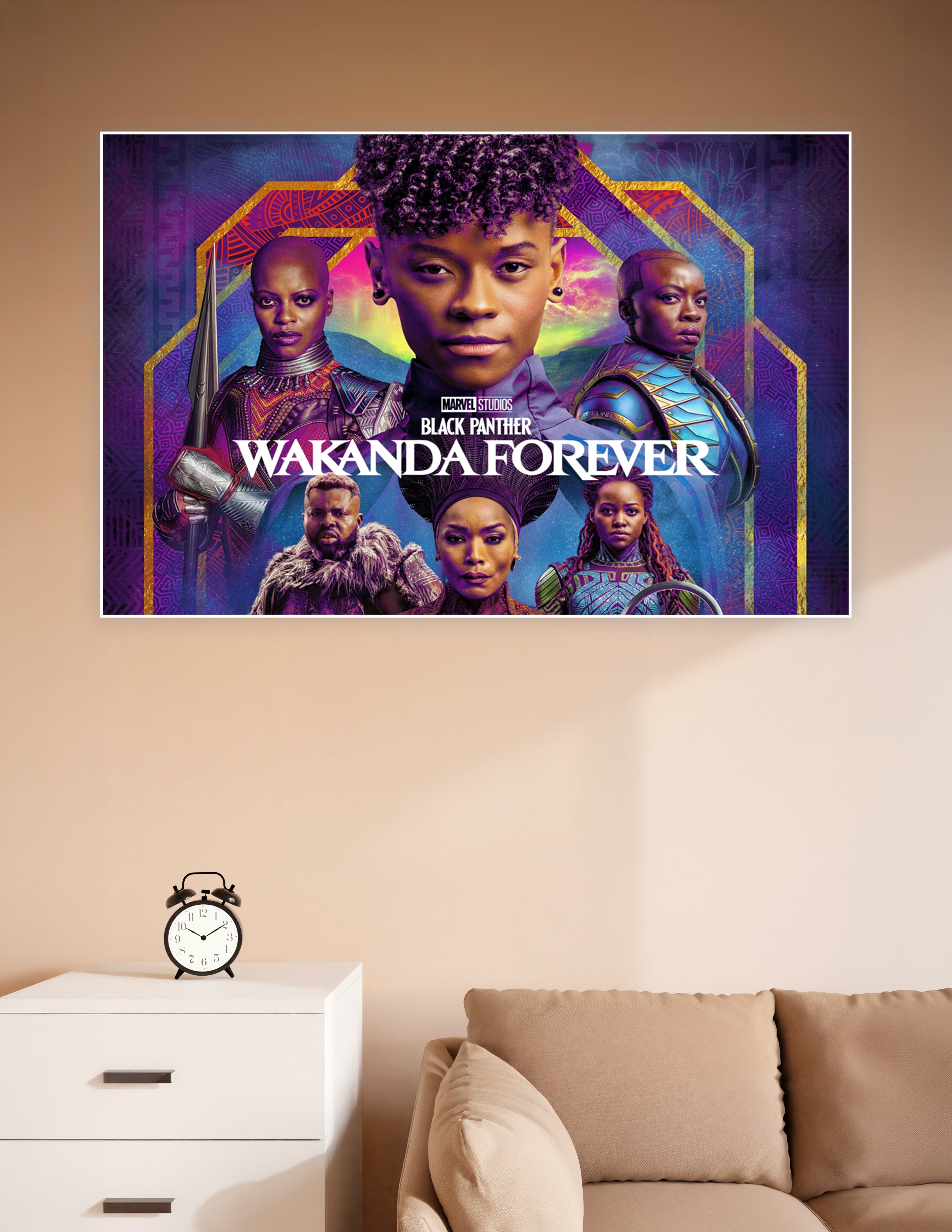 Marvel Studios Black Panther Wakanda Forever official movie poster featuring the full cast in Afrofuturist warrior costumes against a vivid purple and gold background