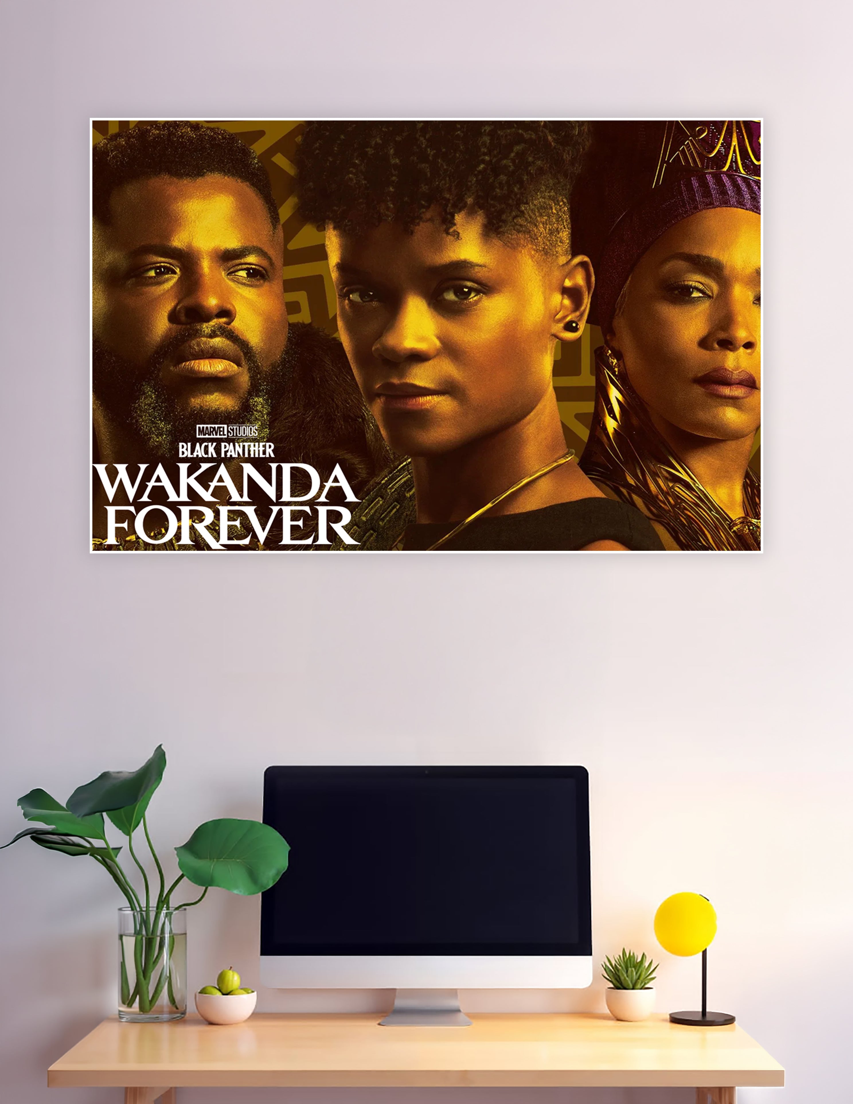 Black Panther Wakanda Forever Marvel Studios movie poster featuring three main characters in dramatic golden lighting