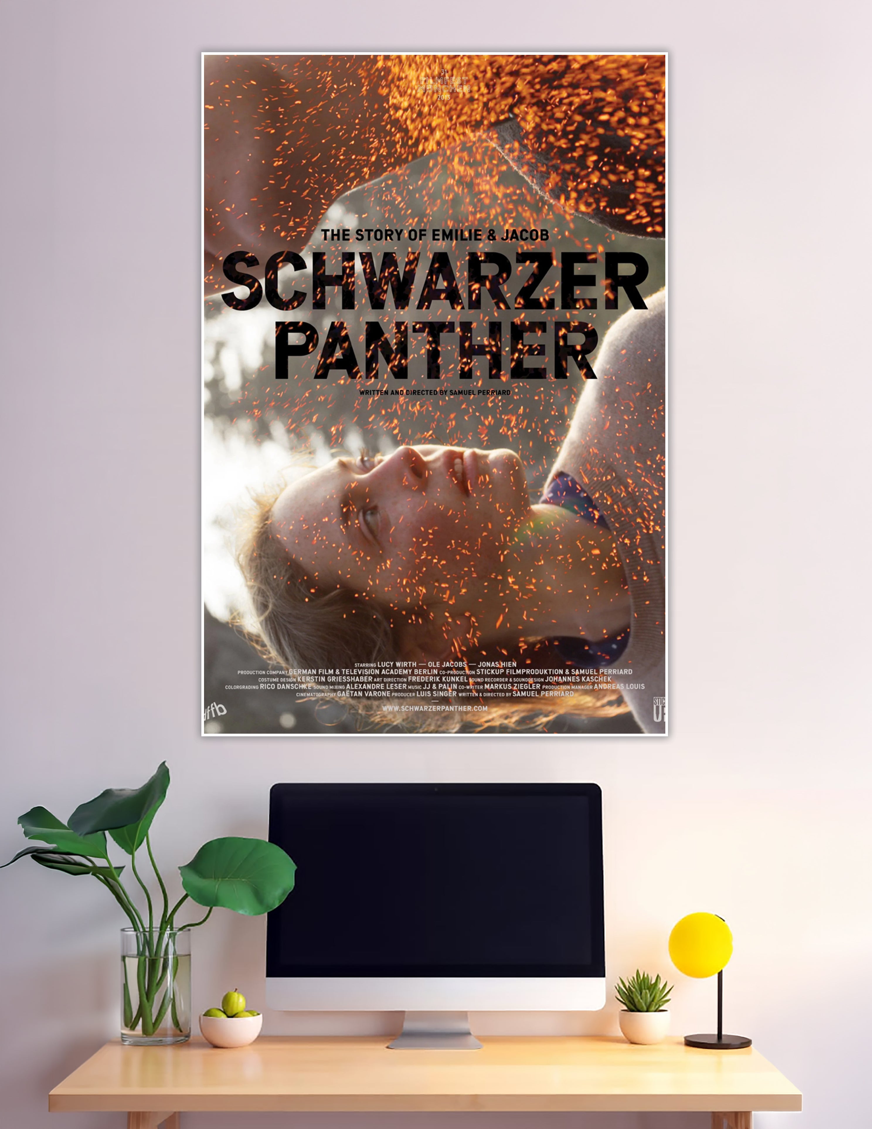 Schwarzer Panther film poster with fiery sparks and bold title