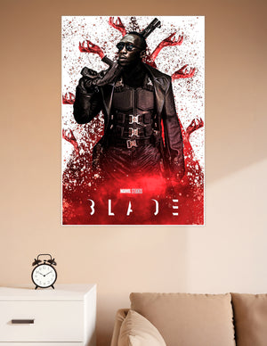Marvel Studios Blade movie poster featuring the vampire hunter in black leather tactical gear holding a gun, surrounded by red vampire claws and blood splatter on a white background