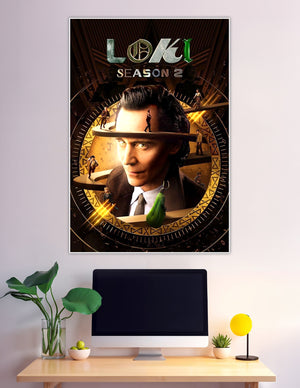 Loki Season 2 official poster featuring the God of Mischief centered in a golden time-wheel with spiraling platforms and rune markings