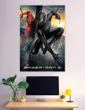 Spider-Man 3 movie poster showing red suit and black symbiote suit side by side on a New York City skyscraper at dusk
