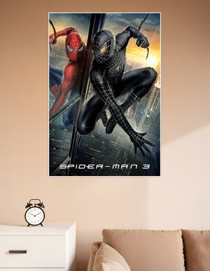 Spider-Man 3 movie poster showing red suit and black symbiote suit side by side on a New York City skyscraper at dusk