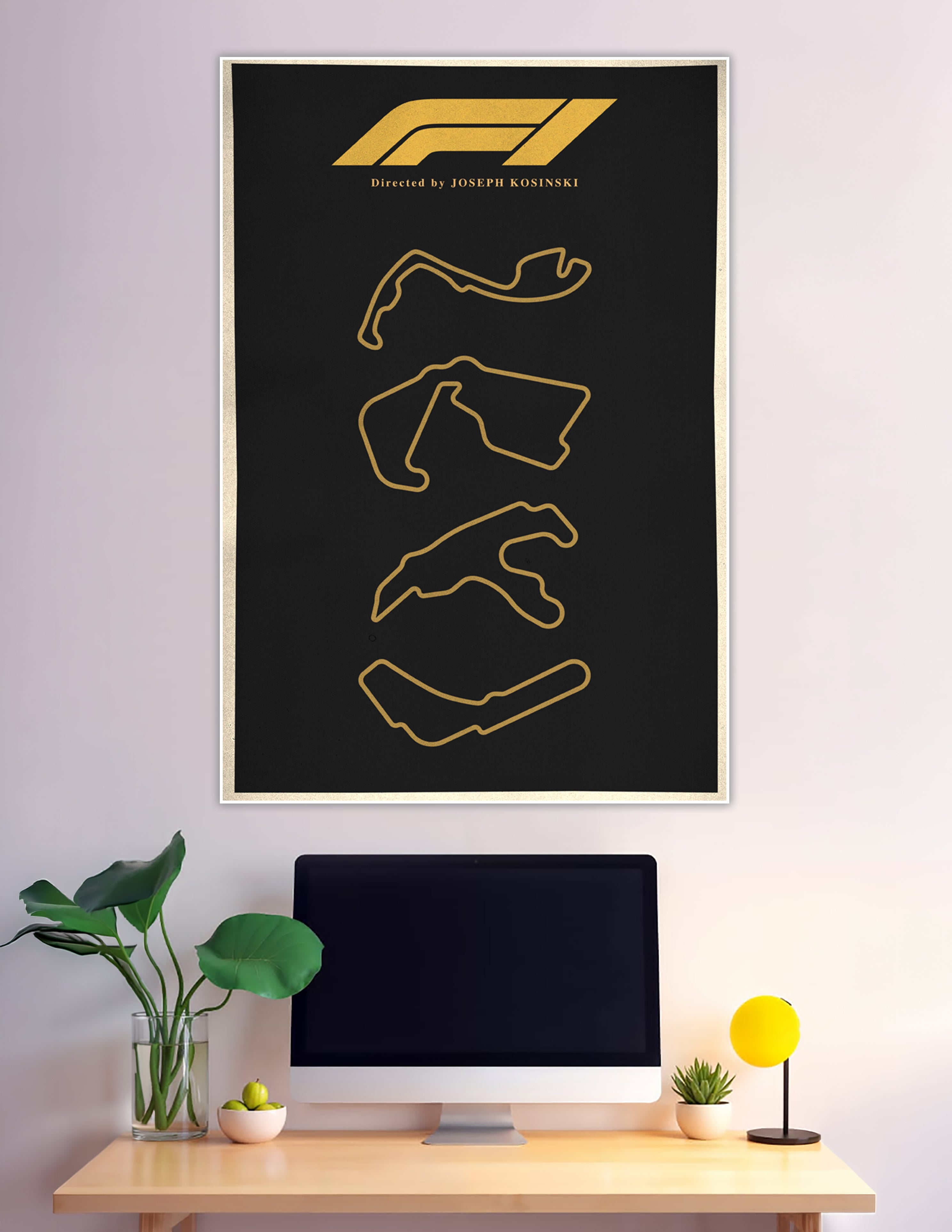 Minimalist F1 movie poster with gold racing circuits on black
