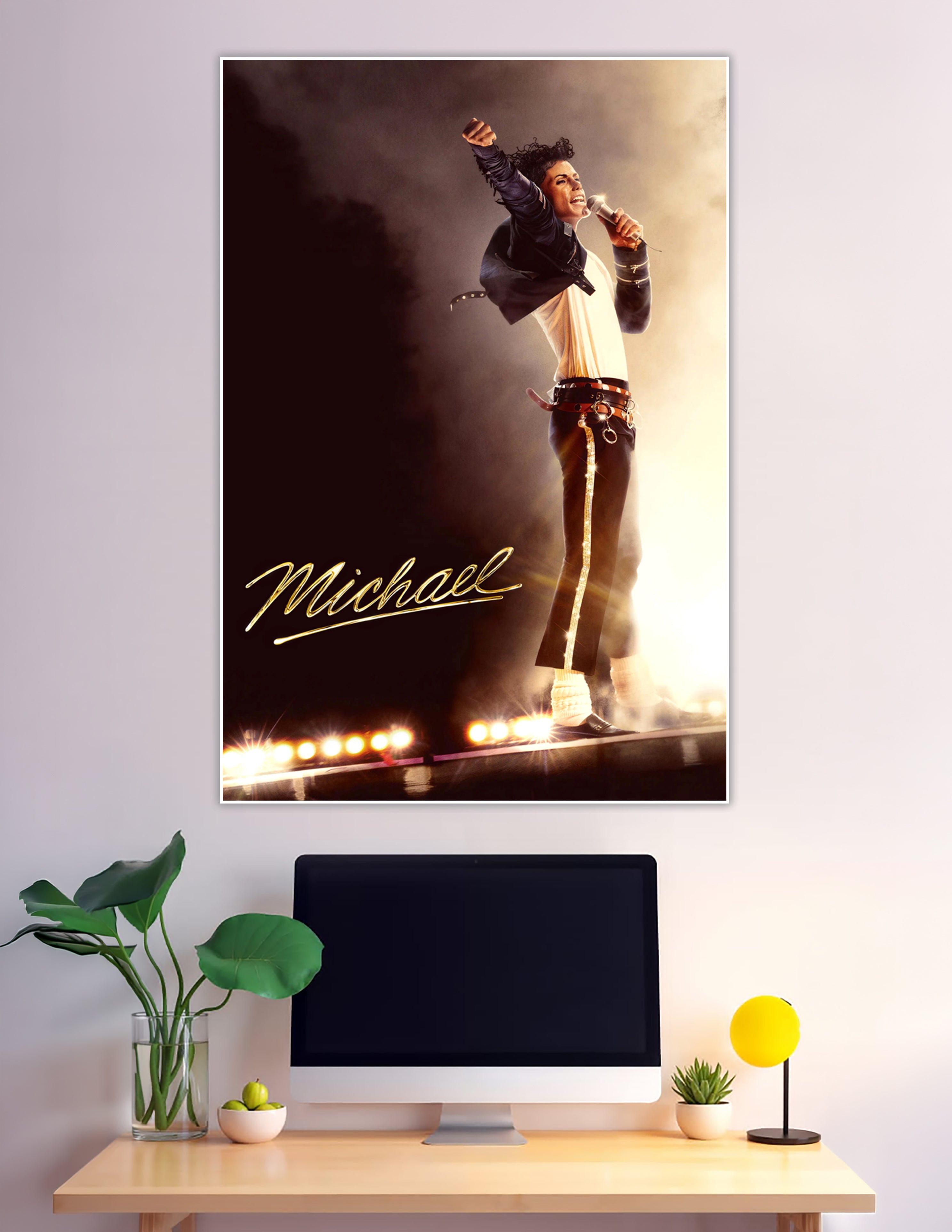 Michael Jackson performing on stage with dramatic lighting