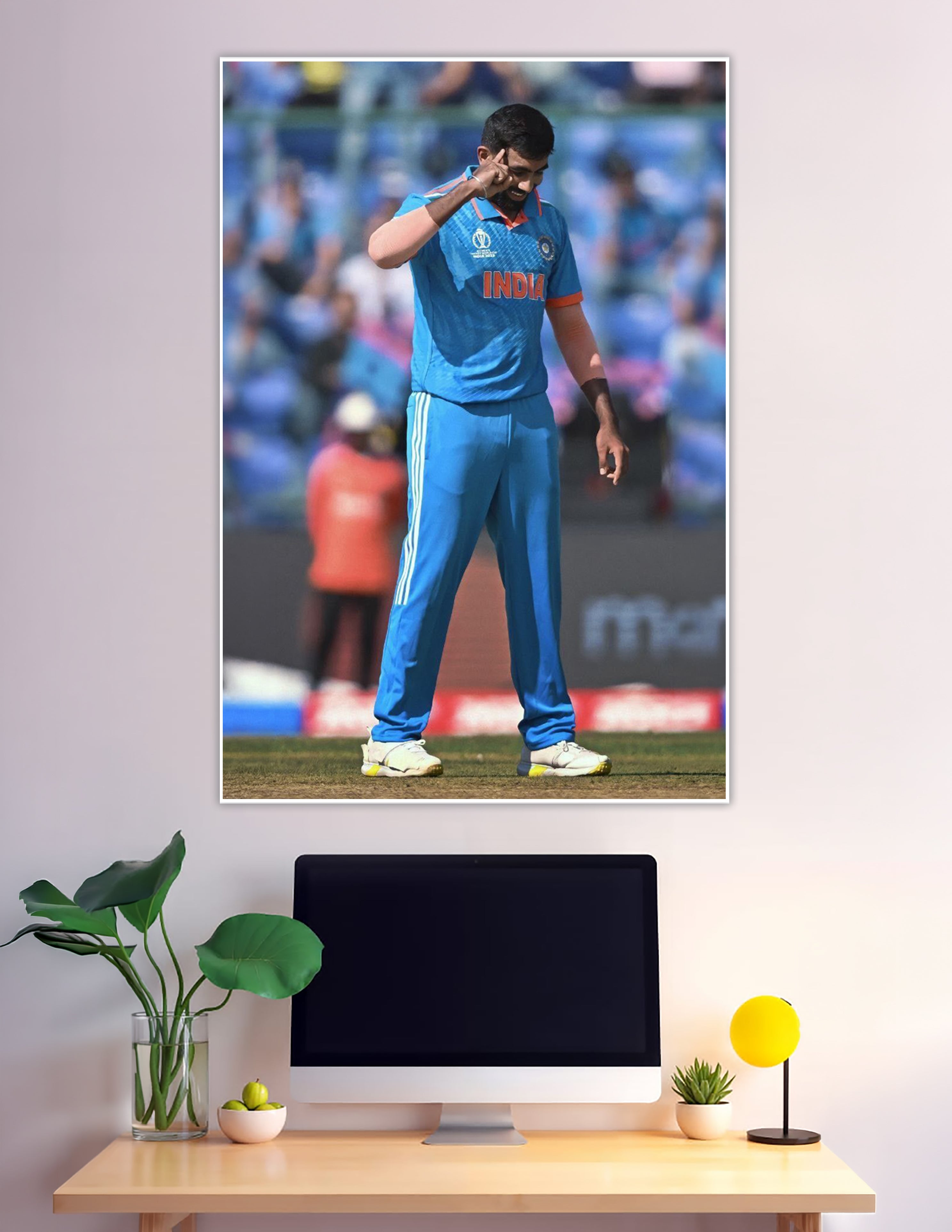 India cricket player celebrating in blue World Cup jersey